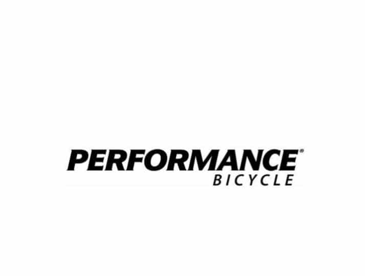 The image displays the Performance Bicycle logo with the word PERFORMANCE in bold black letters and BICYCLE in smaller, lighter black letters beneath it on a white background.