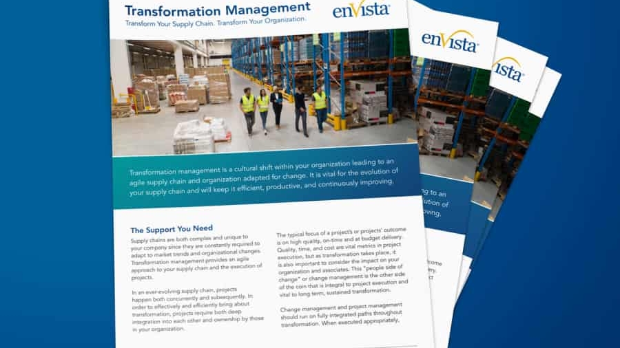 A group of people in a warehouse.