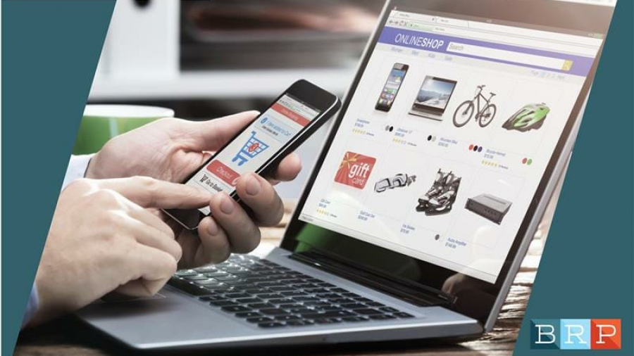 A person uses a smartphone and laptop displaying online shopping websites. Logos for envista and BRP appear, with text: 2019 Special Report: The E-commerce Effect. Platinum Sponsor label is shown.