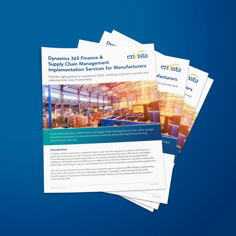 A stack of brochures titled Dynamics 365 Finance & Supply Chain Management Implementation Services for Manufacturers from enVista, featuring a warehouse image on the cover and highlighting Dynamics 365 Finance, placed on a blue background.