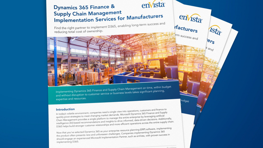 A stack of brochures titled Dynamics 365 Finance & Supply Chain Management Implementation Services for Manufacturers from enVista, featuring a warehouse image on the cover and highlighting Dynamics 365 Finance, placed on a blue background.