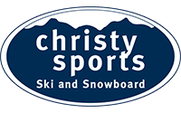 Logo for Christy Sports featuring the words christy sports Ski and Snowboard in white text on a dark blue background, with a silhouette of mountains inside an oval border—ideal for retail consulting presentations or branding.