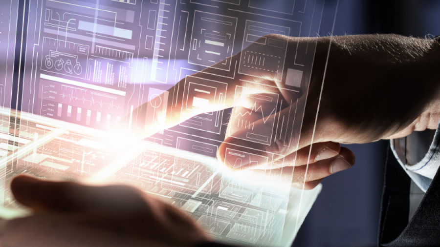 A person interacts with a transparent digital touchscreen displaying various charts, graphs, and data visualizations, suggesting the use of advanced technology or data analysis tools.