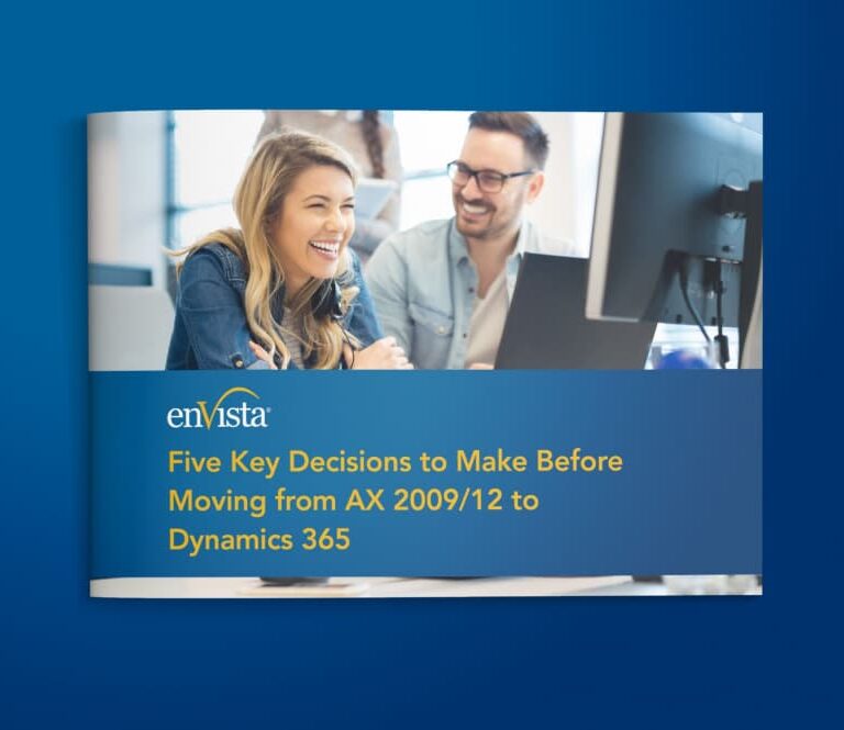 A woman and a man smiling and working at a computer. The cover text reads: Five Key Decisions to Make Before Moving from AX 2009/12 to Dynamics 365. The envista logo is shown above the text.