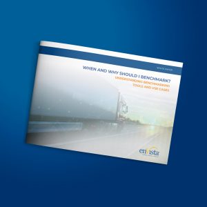 Angled view of a white paper titled “When and Why Should I Benchmark? Understanding Benchmarking Tools and Use Cases” with a semi-transparent truck image, the enVista logo, and a blue background, highlighting Business Intelligence Consulting.