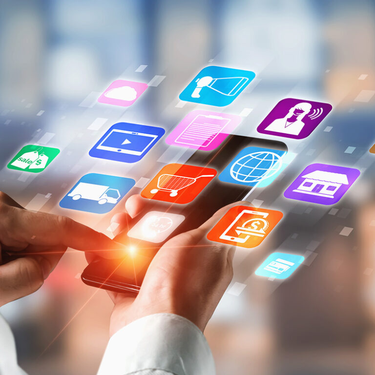 A person uses a smartphone with colorful, floating app icons—shopping, communication, media, and retail OMS—appearing above the device, symbolizing mobile technology and digital connectivity.