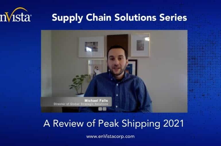 A man sits in front of a computer with a blue background that reads: Supply Chain Solutions Series. A Review of Peak Shipping 2021. His name and title, Michael Falls, Director of Global Strategic Solutions, are displayed on screen.