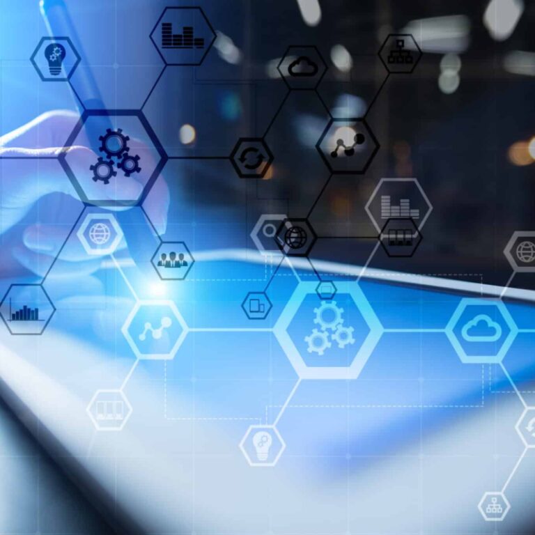 A hand holding a stylus writes on a tablet, with digital hexagons and technology icons overlaid, representing concepts like automation, data, cloud computing, and digital connectivity.