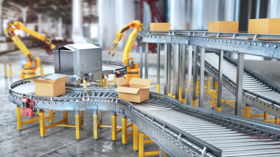 Boxes move along a metal conveyor belt system in a warehouse, with robotic arms placing and sorting packages in the background. The environment appears industrial and automated.