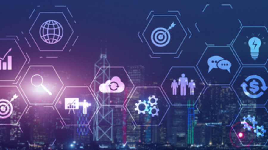 Digital icons representing business, technology, and communication overlay a city skyline at night, symbolizing digital transformation and futuristic innovation powered by Microsoft ERP solutions.