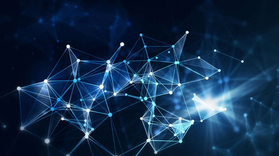 Abstract digital network with interconnected glowing blue and white points and lines on a dark background, resembling a visualization of data, neural networks, or technology connections—perfect for illustrating innovative supply chain strategy concepts.