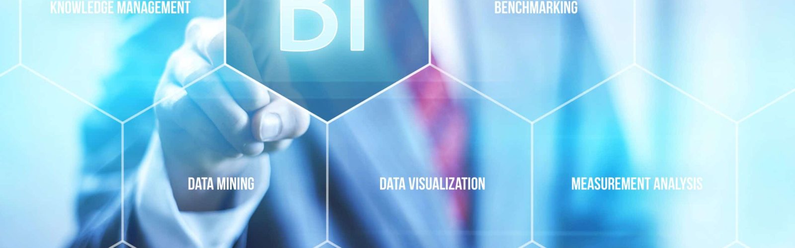 A person in a suit touches a glowing BI icon on a transparent hexagonal interface, surrounded by terms like knowledge management, benchmarking, data mining, data visualization, and measurement analysis.