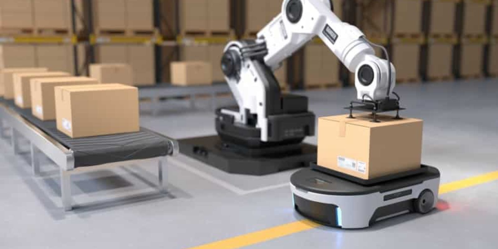 A robotic arm places a cardboard box onto an autonomous mobile robot in a warehouse, showcasing the future of supply chain; more boxes are lined up on a conveyor belt and shelves filled with boxes are in the background.