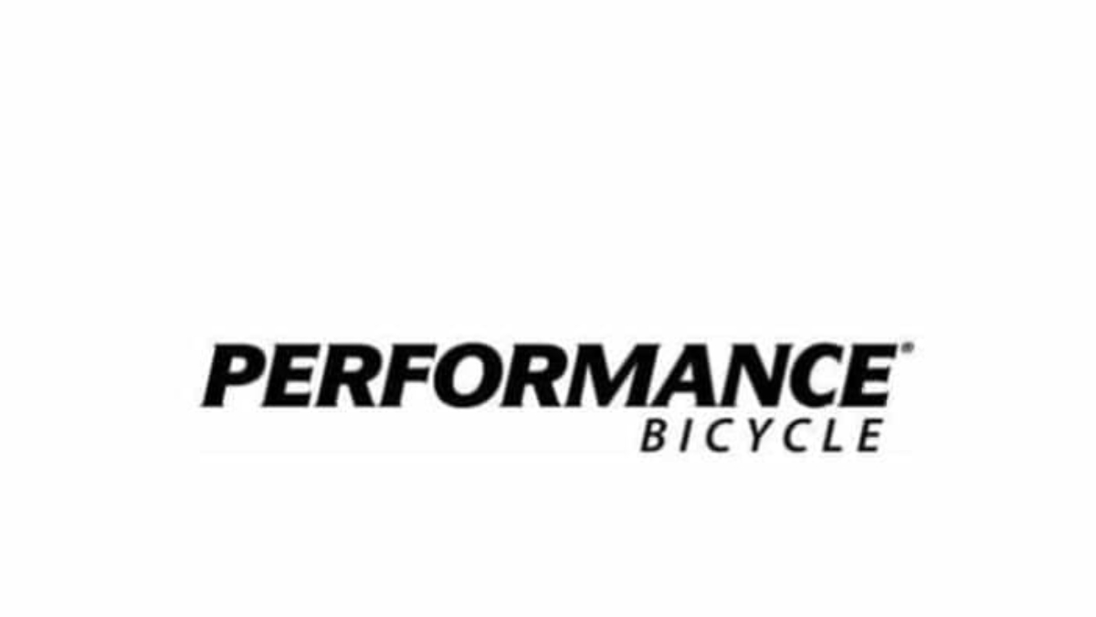 Black text on a white background reads “PERFORMANCE BICYCLE,” with “PERFORMANCE” in bold, uppercase letters and “BICYCLE” in smaller, regular uppercase letters, aligned below and to the right.