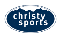 Logo for Christy Sports featuring white lowercase text christy sports on a dark blue oval background, with a white silhouette of mountains along the top edge of the oval.