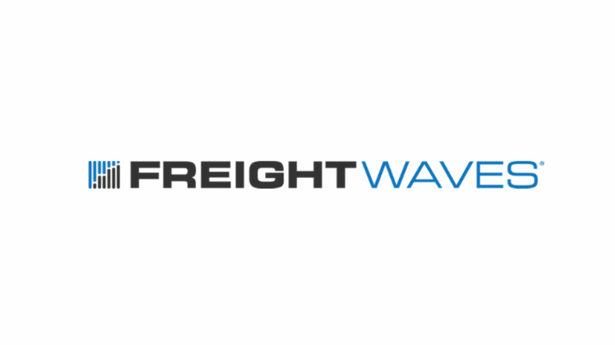 FreightWaves logo featuring a blue icon with vertical lines on the left, bold black text FREIGHT in the center, and blue text WAVES on the right, all on a white background.