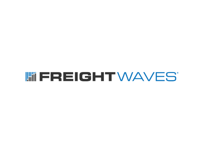 FreightWaves logo featuring a blue icon with vertical lines on the left, bold black text FREIGHT in the center, and blue text WAVES on the right, all on a white background.