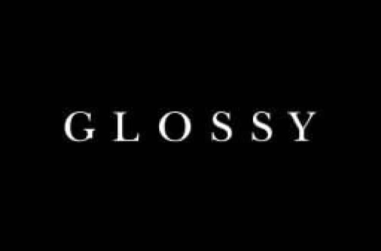 The word GLOSSY is centered in white, uppercase letters on a solid black background.