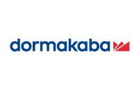 The image shows the dormakaba logo with the word dormakaba in lowercase blue letters followed by a red geometric symbol on a light gray background.