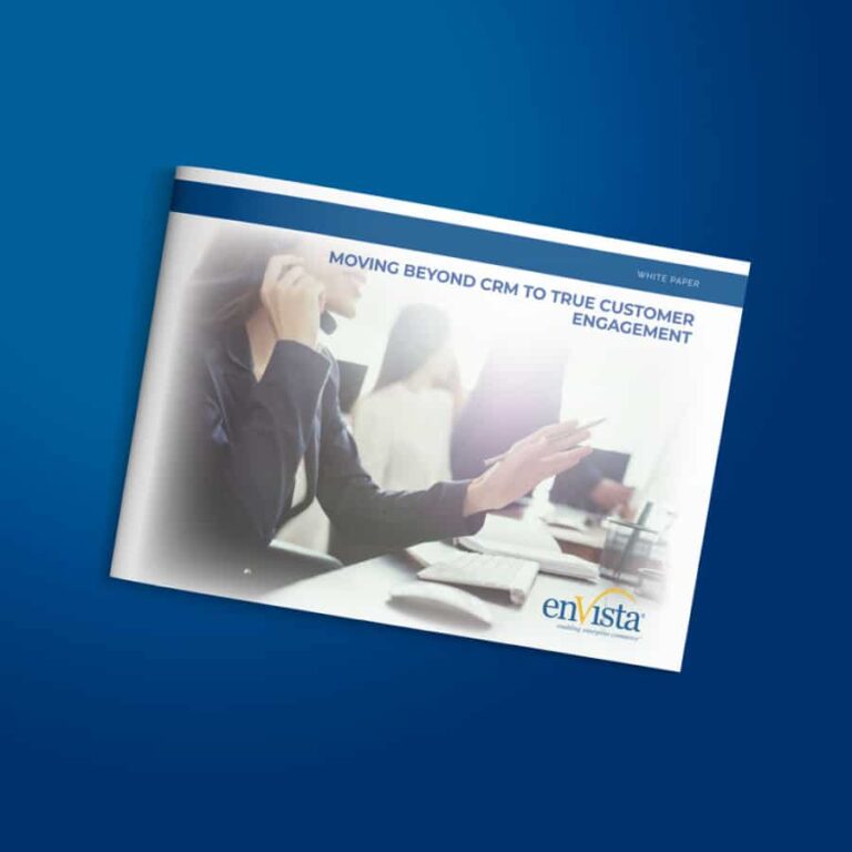 A person wearing a headset sits at a desk with a computer, holding a pen. The cover text reads, Moving Beyond CRM to True Customer Engagement. The enVista logo is at the bottom right corner.
