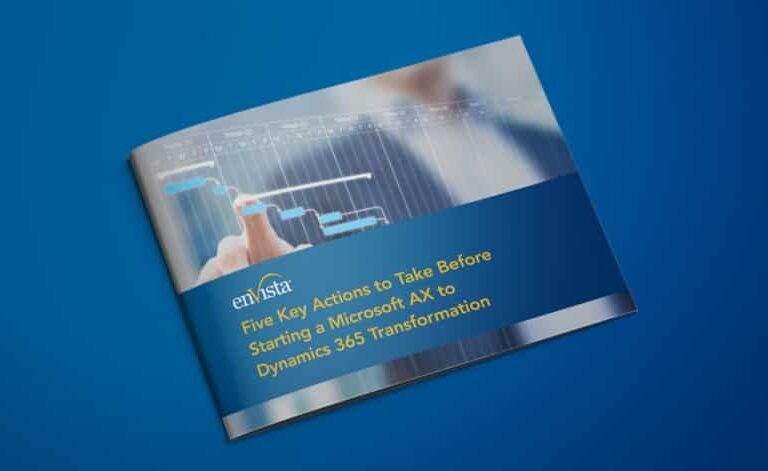 A brochure on a blue surface titled “Five Key Actions to Take Before Starting a Microsoft AX to Dynamics 365 Transformation” with a blurred image of a person pointing at a digital graph.