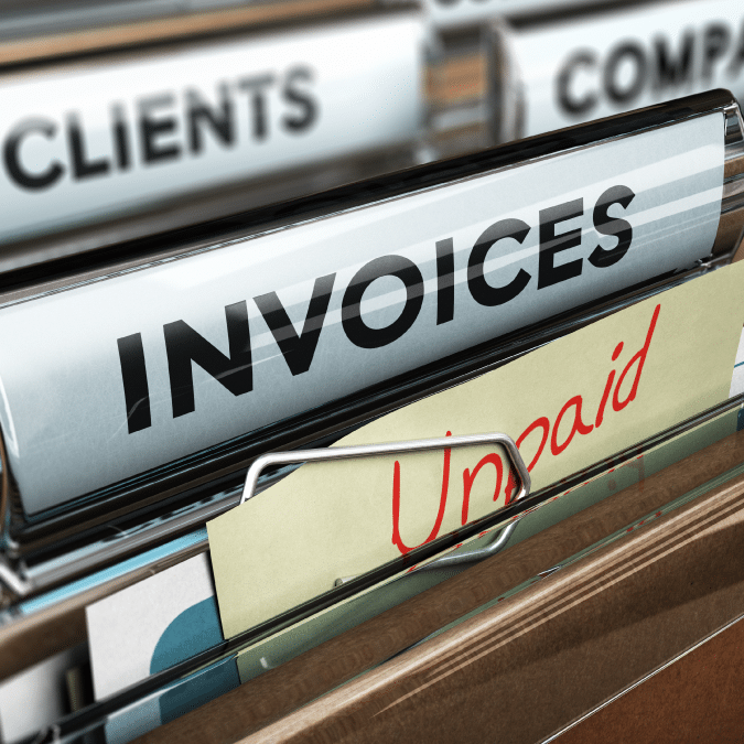 A file folder labeled INVOICES contains documents, including one marked Unpaid in red letters. Other folders labeled CLIENTS and COMP are partially visible in the background.