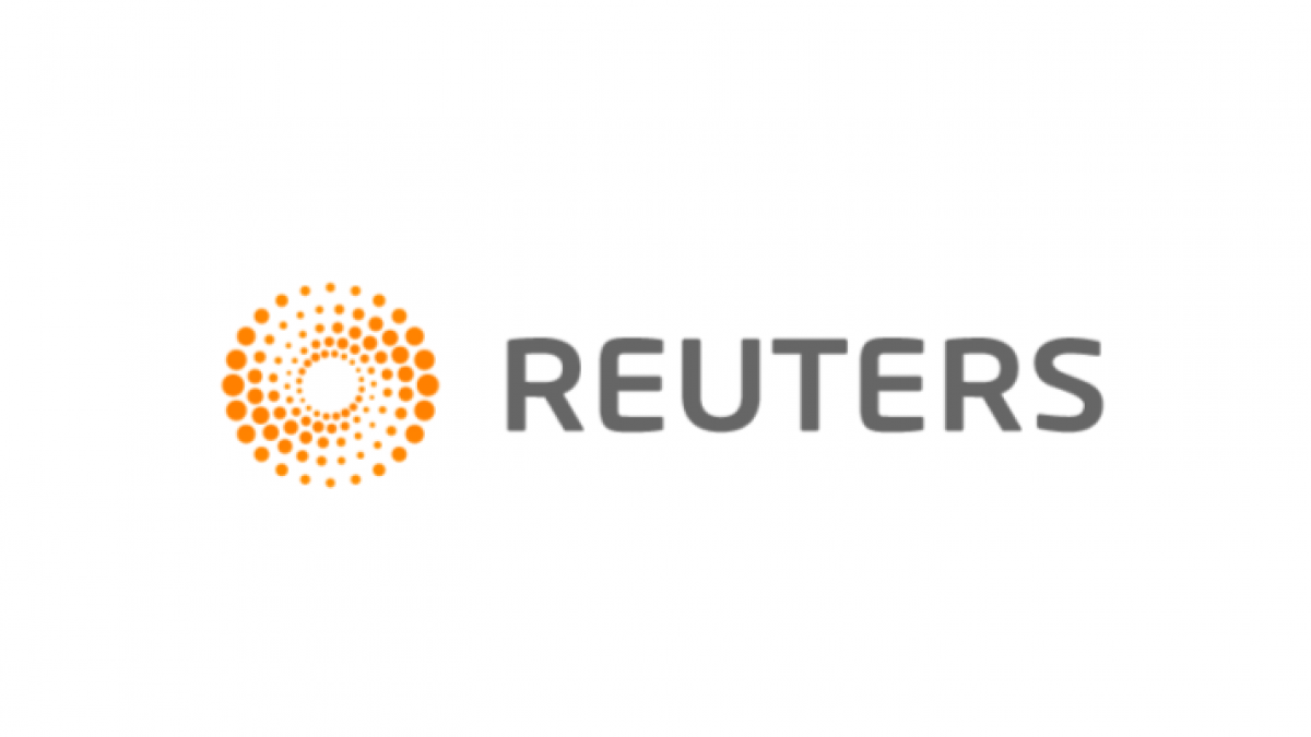 Reuters logo featuring an orange circular dot pattern on the left and the word REUTERS in gray uppercase letters on the right, all set against a white background.