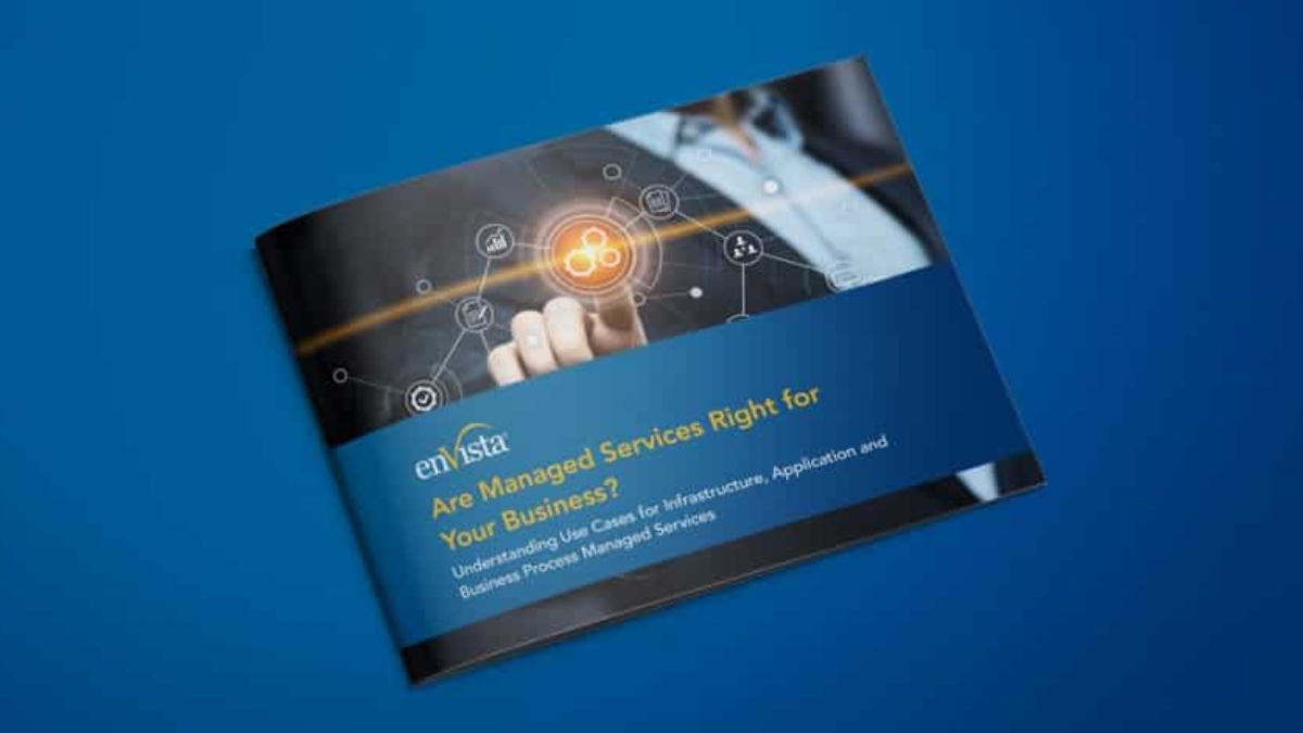 A brochure on a blue background featuring a person in business attire touching a digital network icon. The brochure title reads: Are Managed Services Right for Your Business? with additional text underneath.