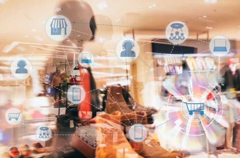 A blurred retail store with shoes and clothes displays, overlaid with digital shopping icons like a shopping cart, store, and user profiles, representing online and in-store shopping integration.