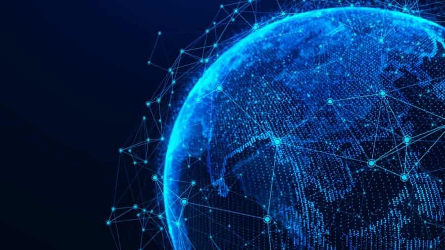 A digital, blue-toned rendering of Earth viewed from space, overlaid with glowing network lines and connection points, symbolizing global connectivity and data exchange.
