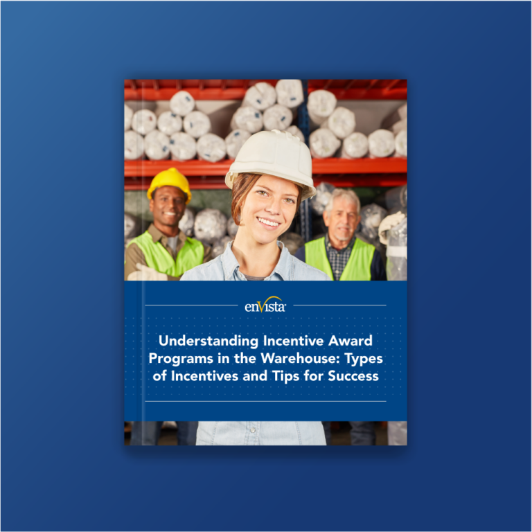 Cover image for a guide titled Understanding Incentive Award Programs in the Warehouse. Features a smiling woman in a hard hat and safety vest, with two warehouse workers and shelves of rolled materials in the background.