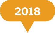 An orange speech bubble with a pointed tail featuring the year 2018 in bold white text at the center.