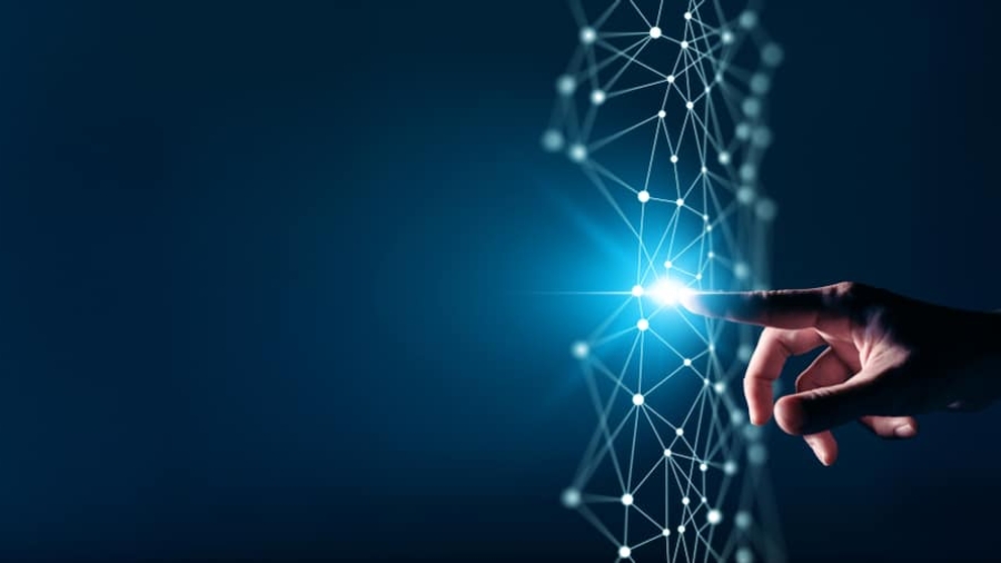 A hand reaching out to touch a glowing point on a digital network of connected lines and nodes, symbolizing technology, innovation, and the power of digital transformation consulting against a dark blue background.