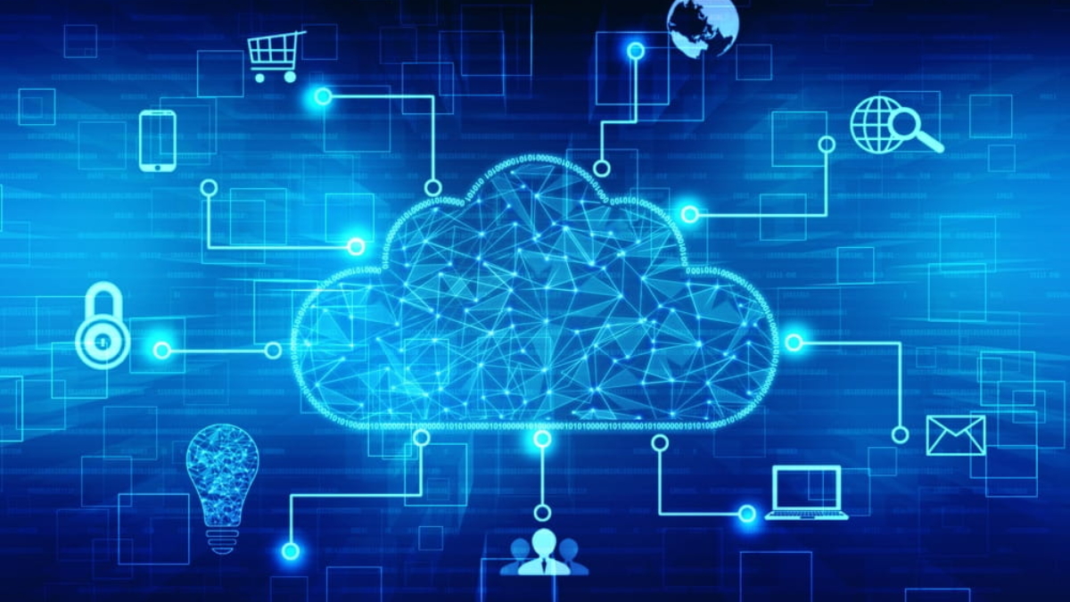 A glowing cloud icon in the center is surrounded by digital icons such as a lock, shopping cart, globe, laptop, email, and light bulb, representing various internet and cloud computing concepts on a blue digital background.
