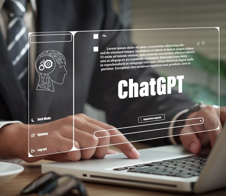 A person in a suit uses a laptop with a transparent virtual interface displaying ChatGPT, a brain illustration, and various menu options.