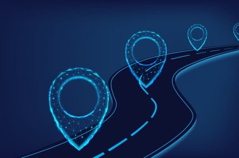 A digital illustration of a winding road with glowing blue location pins made of connected dots and lines, symbolizing navigation or mapping technology on a dark blue background.