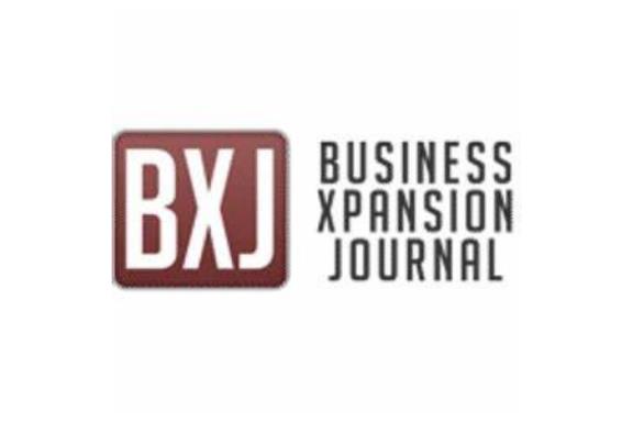 Logo for Business Xpansion Journal. The letters BXJ are in bold white text inside a red square, with Business Xpansion Journal and Intermodal Logistics written in black capital letters to the right.