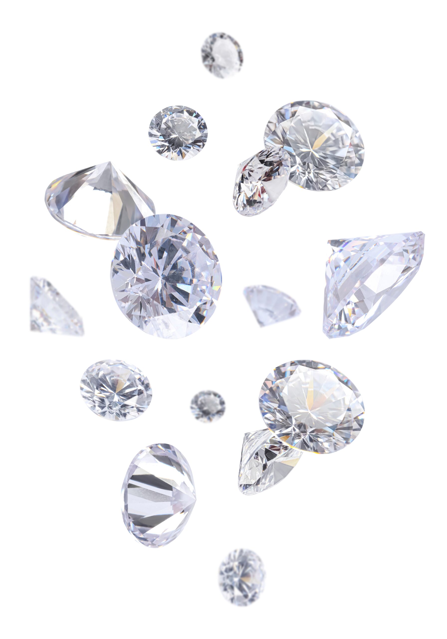 Multiple sparkling, round-cut diamonds of various sizes float against a white background, showcasing their brilliant facets and reflective surfaces.