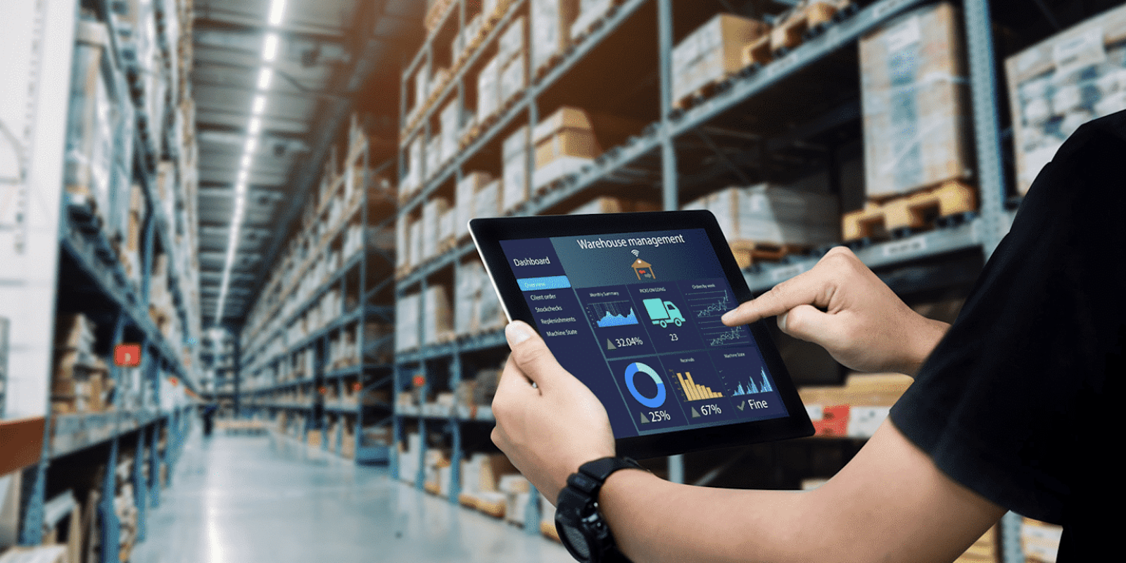 A person uses a tablet displaying warehouse management software in a large warehouse filled with shelves and boxes, highlighting digital inventory control and the benefits of warehouse automation technologies.