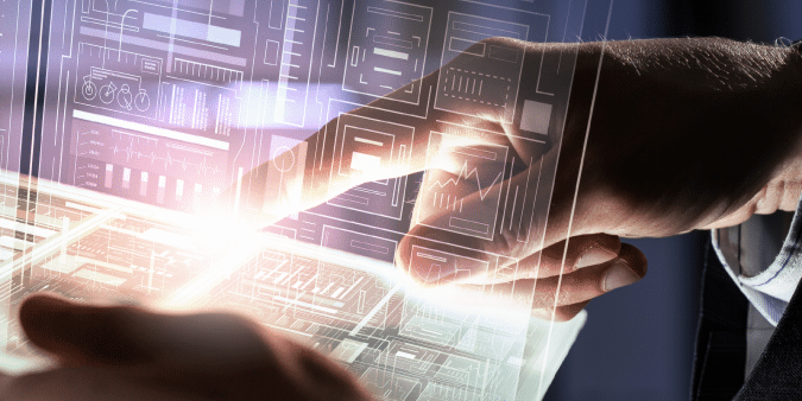 A person’s hands interact with a transparent touchscreen displaying digital charts, graphs, and data visualizations, suggesting futuristic technology and advanced data analysis.
