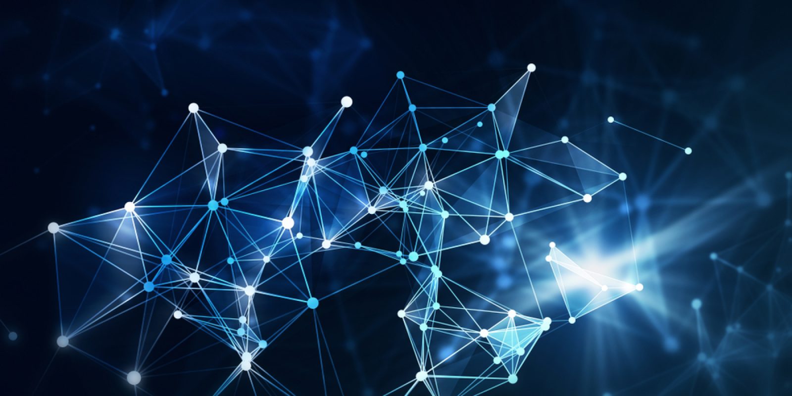 Abstract image of interconnected glowing blue and white lines and nodes forming a network or neural web, symbolizing the complexity of supply chain strategy, set against a dark blurred background with light flares.