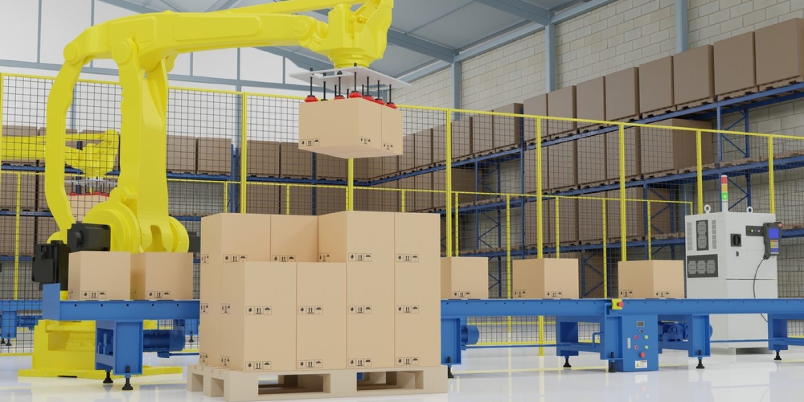 A yellow robotic arm performs automated palletization, moving cardboard boxes onto a conveyor belt in a clean, brightly lit warehouse, with shelves of additional boxes in the background.